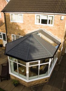 A conservatory installation with a tiled roof