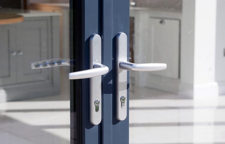 Aluminium bifold doors with chrome handles