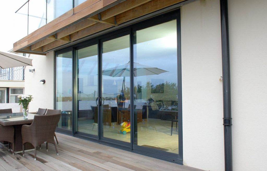 Large grey aluminium sliding patio door