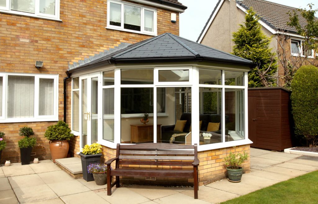 uPVC Victorian conesrvatory with a tiled roof