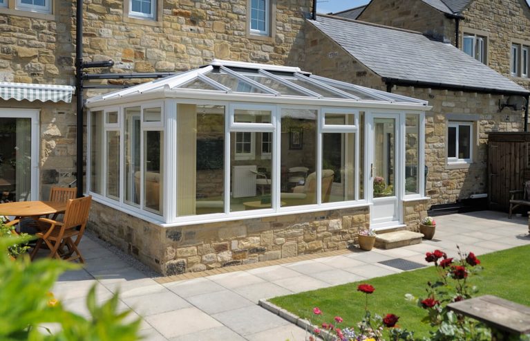 White uPVC Georgian conservatory with a glass roof
