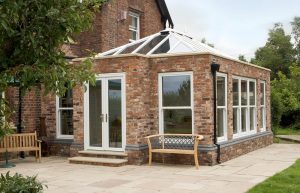 White uPVC orangery with a pitched roof