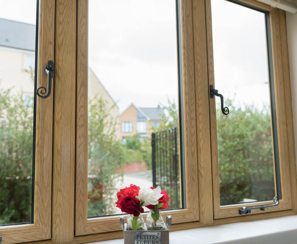 Irish Oak Flush Sash windows with Monkey Tail handles.