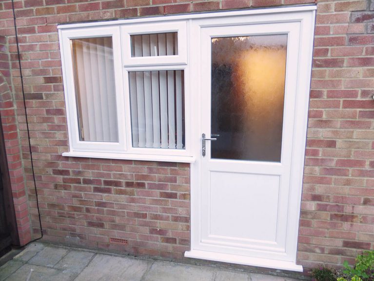 White UPVC entrance door textured glass.