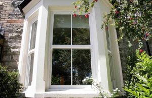 Vertical sliding bow window