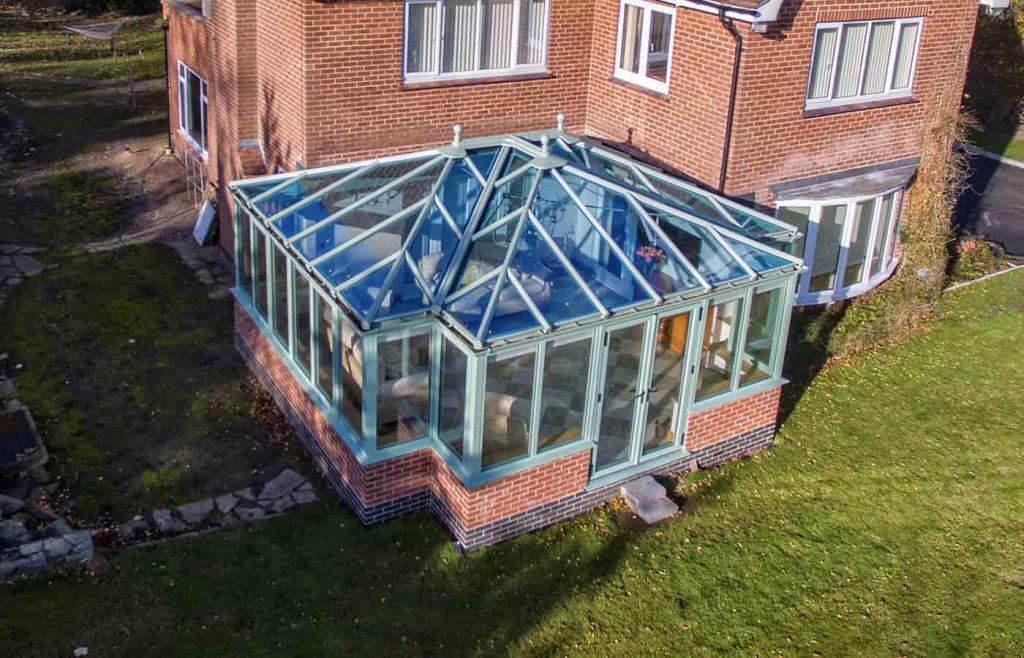 Green t-shaped conservatory