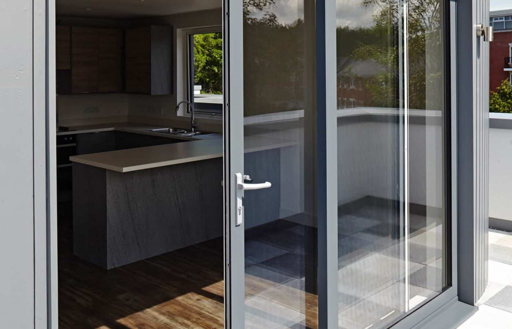 Grey aluminium sliding patio door close up