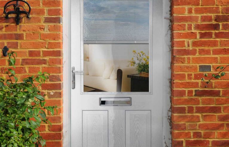 Grey composite front door with single glazed window