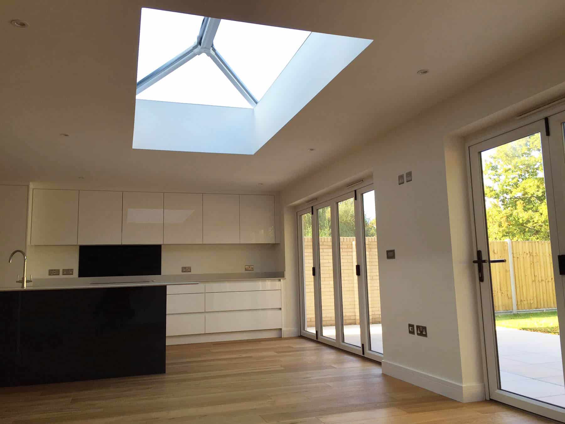 Extension with a white roof lantern